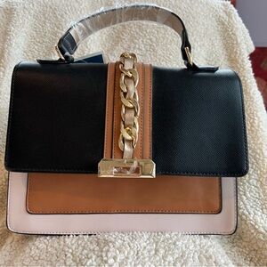 Chic Black and Tan Satchel with Gold Chain Detail